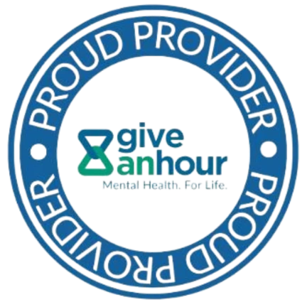 A circular logo for "Give an Hour" with the text "Proud Provider" surrounding the logo, promoting mental health services.