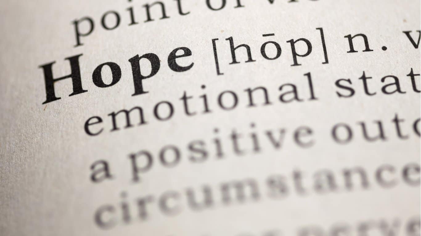 Close-up of a dictionary page showing the word Hope, its pronunciation, and part of its definition.
